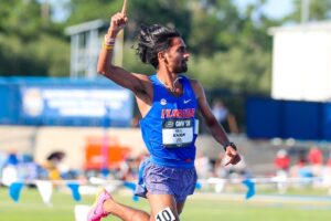 Who is runner Parvej Khan secured top spot in 1500m finals?