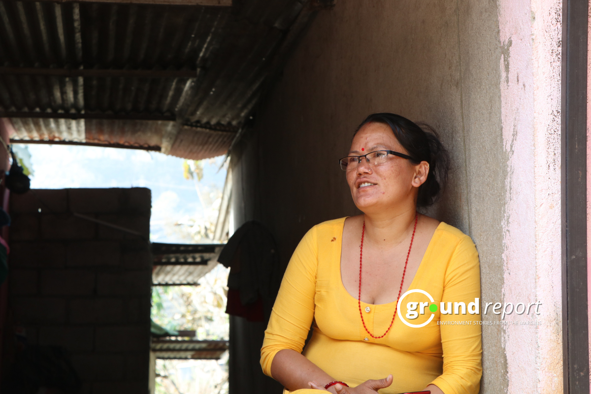 Urmila Tamang, 36, in her house, who also claims she is feeling hotter than usual after insulation of solar planes