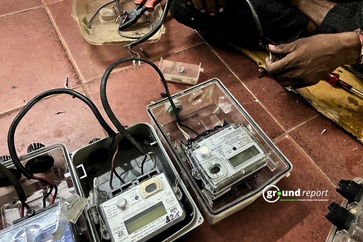 Technician doing Pulse testing of old meter at electricity board office in Sehore