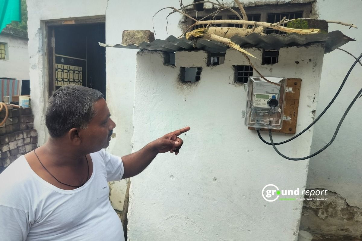 Rajesh Kushwaha showing is smart meter installed at his house