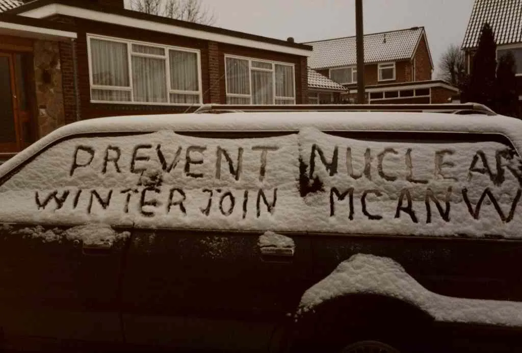 Protest writing in snow 'Prevent Nuclear Winter Join MCANW' |