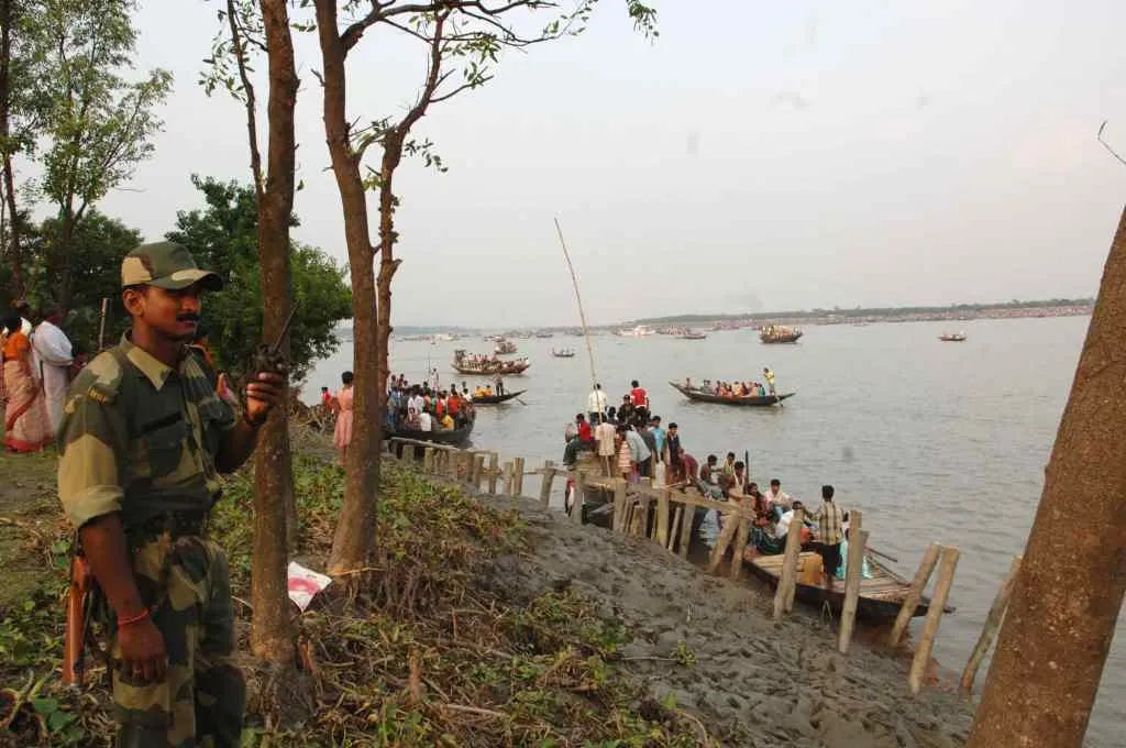 At the river Ichamati the border of India and Bangladesh where the devotees from both the side meeting to celebrate the immersion of the idol Goddess Durga