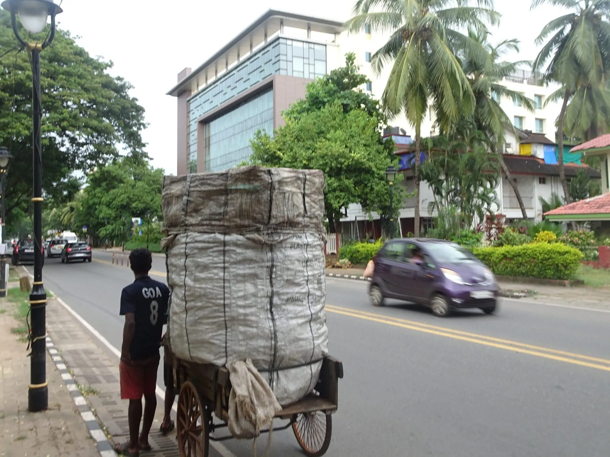 Dry Waste collector on a tri-cycle D B Road Miramar opp Fortune Hotel |