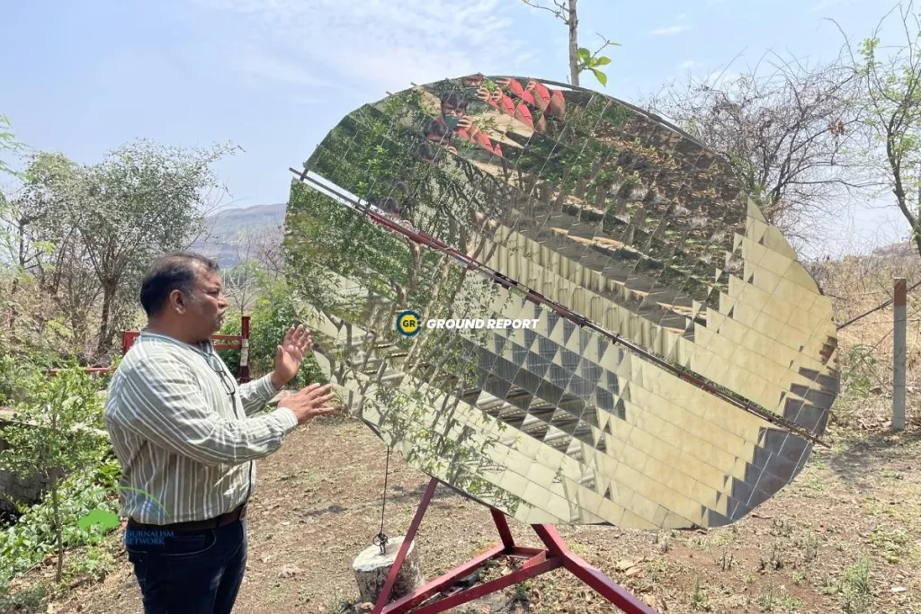 Sameer Sharma, the co-founder of Swaaha, explaining the working of Scheffler solar concentrator works | location Indore, Madhya Pradesh | Photo: Rajeev Tyagi